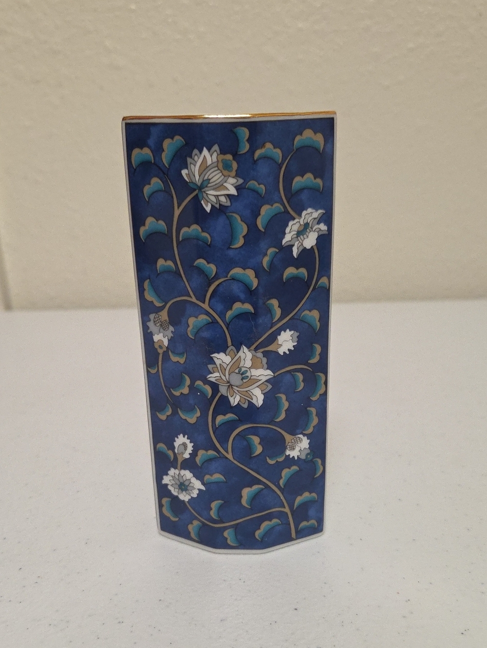 Blue Floral Ceramic Accent Vase with Gold Trim and White Details